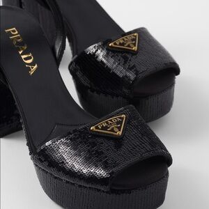 Prada black sequin heels with gold logo plaque